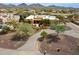 Beautiful view showcasing the home's landscaping, circular driveway and mountain views at 40627 N 6Th Ave, Phoenix, AZ 85086