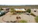 Aerial view of the property showing the home, landscaping, and surrounding desert landscape at 40627 N 6Th Ave, Phoenix, AZ 85086