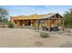 The backyard features a covered patio and an outdoor seating area at 40627 N 6Th Ave, Phoenix, AZ 85086