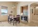 Dining room with pendant lights, wine cooler and table for four at 40627 N 6Th Ave, Phoenix, AZ 85086