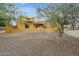 Exterior view of home showing desert landscaping, and stucco facade at 40627 N 6Th Ave, Phoenix, AZ 85086