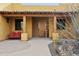 Inviting front porch with seating area and tiled roof at 40627 N 6Th Ave, Phoenix, AZ 85086