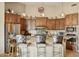 Kitchen with wood cabinets, stainless steel appliances, and barstool seating at 40627 N 6Th Ave, Phoenix, AZ 85086