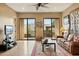 Living room with slider doors and rustic decor at 40627 N 6Th Ave, Phoenix, AZ 85086