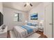 Cozy bedroom with comfortable bed, stylish decor, and serene natural light at 4450 E Amberwood Dr, Phoenix, AZ 85048