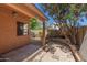 Cozy covered patio with a mix of concrete and paver flooring at 4450 E Amberwood Dr, Phoenix, AZ 85048