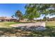 Sand volleyball court surrounded by lush landscaping and common area at 4450 E Amberwood Dr, Phoenix, AZ 85048