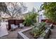 Stylish backyard featuring modern outdoor furniture and desert landscaping at 5033 E Turquoise Ave, Paradise Valley, AZ 85253