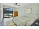 Bright bedroom with large windows overlooking the pool area and backyard at 5033 E Turquoise Ave, Paradise Valley, AZ 85253