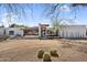 Modern home with desert landscaping, featuring clean architectural lines and a gravel driveway at 5033 E Turquoise Ave, Paradise Valley, AZ 85253