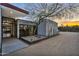Modern home exterior featuring a landscaped entrance with desert plants and clean architecture at 5033 E Turquoise Ave, Paradise Valley, AZ 85253