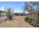 Expansive desert property featuring a modern home with clean lines and native landscaping at 5033 E Turquoise Ave, Paradise Valley, AZ 85253