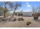 Modern home exterior showcasing desert landscaping and unique architectural details at 5033 E Turquoise Ave, Paradise Valley, AZ 85253