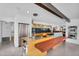 Stylish kitchen with stainless steel appliances, custom cabinets, and modern island at 5033 E Turquoise Ave, Paradise Valley, AZ 85253
