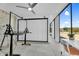 Bright living room with a ceiling fan and an open view, featuring white cabinets and modern decor at 5033 E Turquoise Ave, Paradise Valley, AZ 85253