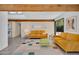 Comfortable living room with hardwood floors, wood beam ceilings, and stylish furnishings at 5033 E Turquoise Ave, Paradise Valley, AZ 85253