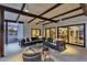 Inviting covered patio featuring stylish outdoor seating and seamless indoor-outdoor flow at 5033 E Turquoise Ave, Paradise Valley, AZ 85253