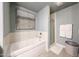 The bathroom features a pristine soaking tub, perfect for unwinding at 5450 E Deer Valley Dr # 1186, Phoenix, AZ 85054