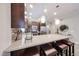 Kitchen featuring stainless steel appliances, bar stool seating and pendant lighting at 5450 E Deer Valley Dr # 1186, Phoenix, AZ 85054