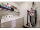 Well-lit laundry room equipped with a washer, dryer, and ample storage space at 5450 E Deer Valley Dr # 1186, Phoenix, AZ 85054