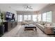 Comfortable living room with plush seating, ample natural light, and stylish decor at 5450 E Deer Valley Dr # 1186, Phoenix, AZ 85054