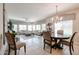 Open-concept living space with neutral colors, tiled flooring and large windows at 5450 E Deer Valley Dr # 1186, Phoenix, AZ 85054