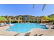 Enjoy the community pool with luxurious seating and resort-style landscaping at 5450 E Deer Valley Dr # 1186, Phoenix, AZ 85054
