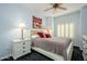 Light and airy bedroom with cozy furnishings and light blue walls at 5450 E Deer Valley Dr # 2023, Phoenix, AZ 85054