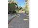 Sidewalk showcasing desert landscaping and the residential building architecture at 5450 E Deer Valley Dr # 2023, Phoenix, AZ 85054