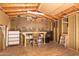The shed features plywood walls and ceiling and a workbench area for projects and storage at 547 E Sack Dr, Phoenix, AZ 85024