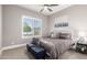 Bedroom featuring a large sunny window, ceiling fan, and carpeting at 6112 E Calle De Pompas --, Cave Creek, AZ 85331