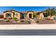 Charming single-story home featuring desert landscaping, a tiled walkway, and a covered entryway at 6112 E Calle De Pompas --, Cave Creek, AZ 85331