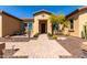 Inviting front yard with a tiled walkway, desert landscaping, and a charming entryway at 6112 E Calle De Pompas --, Cave Creek, AZ 85331