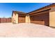 Spacious three-car garage with brick-paved driveway and access to a private fenced-in backyard at 6112 E Calle De Pompas --, Cave Creek, AZ 85331