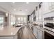 Well-appointed kitchen with granite countertops, stainless steel appliances, and a view to the adjacent dining area at 6112 E Calle De Pompas --, Cave Creek, AZ 85331
