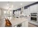 Gourmet kitchen featuring a large island, stainless steel appliances, pendant lighting, and modern finishes at 6112 E Calle De Pompas --, Cave Creek, AZ 85331