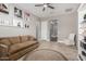 Comfortable living room with neutral walls, natural light, and a cozy couch at 6112 E Calle De Pompas --, Cave Creek, AZ 85331