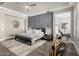 Main bedroom features wood floors, panel wall, ceiling fan and a full home gym in the next room at 6112 E Calle De Pompas --, Cave Creek, AZ 85331