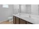 Modern bathroom with a double sink vanity, neutral color palette, and a shower/tub combo, providing a clean and functional space at 696 W Glen Canyon Dr, San Tan Valley, AZ 85140