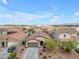 Inviting single-story home with desert landscaping, a two-car garage, and a long driveway in a residential neighborhood at 696 W Glen Canyon Dr, San Tan Valley, AZ 85140
