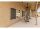 Covered patio overlooking a pool and outdoor space perfect for outdoor entertaining at 760 W Douglas Ave, Gilbert, AZ 85233