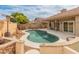 Backyard pool area featuring an in-ground kidney-shaped pool with desert landscaping at 760 W Douglas Ave, Gilbert, AZ 85233