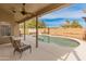 Covered patio overlooking a pool and outdoor space perfect for outdoor entertaining at 760 W Douglas Ave, Gilbert, AZ 85233