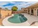 Backyard pool area featuring an in-ground kidney-shaped pool with desert landscaping at 760 W Douglas Ave, Gilbert, AZ 85233