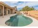 Backyard pool area featuring an in-ground kidney-shaped pool with desert landscaping at 760 W Douglas Ave, Gilbert, AZ 85233