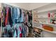 Spacious walk-in closet with built-in shelving and plenty of room for storage at 760 W Douglas Ave, Gilbert, AZ 85233