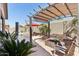 Relaxing outdoor area with covered patio, pergola, and inviting pool, perfect for entertaining or quiet enjoyment at 8014 W Ross Ave, Peoria, AZ 85382