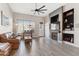 Cozy living room features wood look floors and stylish decor at 8014 W Ross Ave, Peoria, AZ 85382