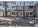 Inviting townhome with beautiful curb appeal, showcasing a well-kept exterior and charming architectural details at 860 N Mcqueen Rd # 1028, Chandler, AZ 85225