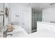 Bright bathroom showcasing dual sinks, modern fixtures, shower, and ample counter space at 8738 E Rose Ln, Scottsdale, AZ 85250